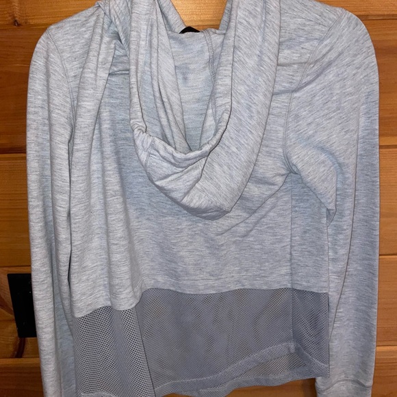 Like new cropped sweatshirt mesh material on bottom half. - Picture 6 of 6